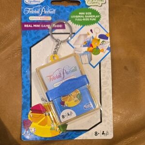 Hasbro Trivial Pursuit Mini Keychain Game - Blue and Yellow